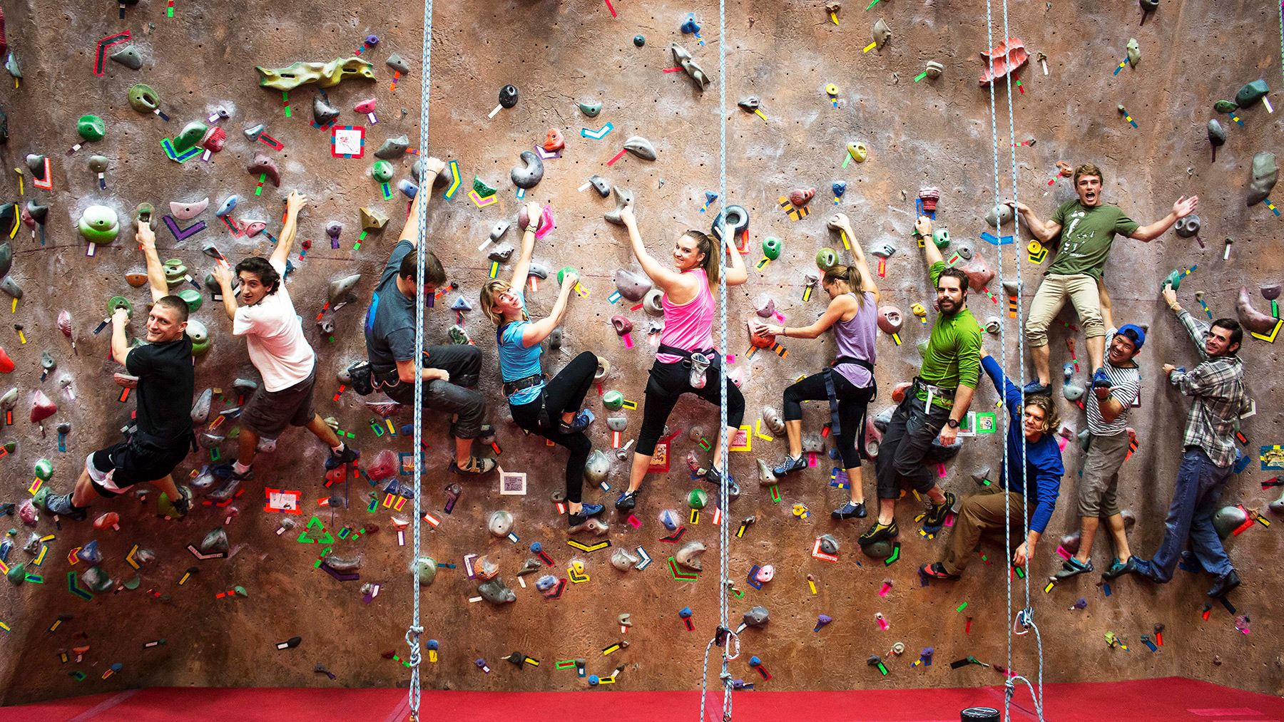 Students climbing on the ARC rock wall
