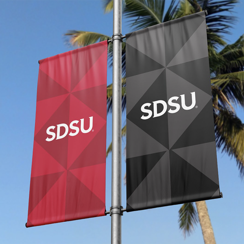 Color contrast example: White SDSU logo on black and red pole banner