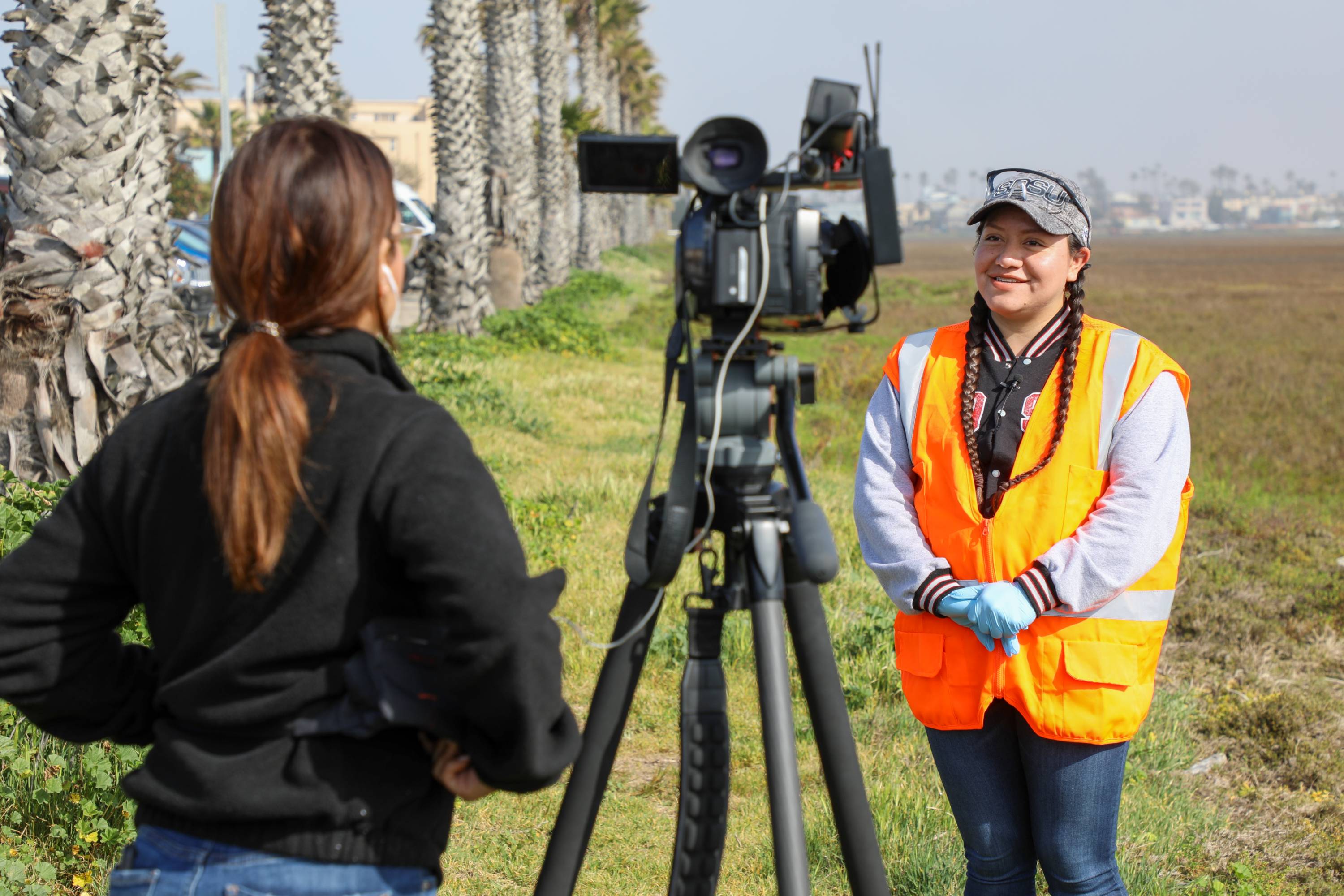 Student researcher being interviewed in the Tijuana River