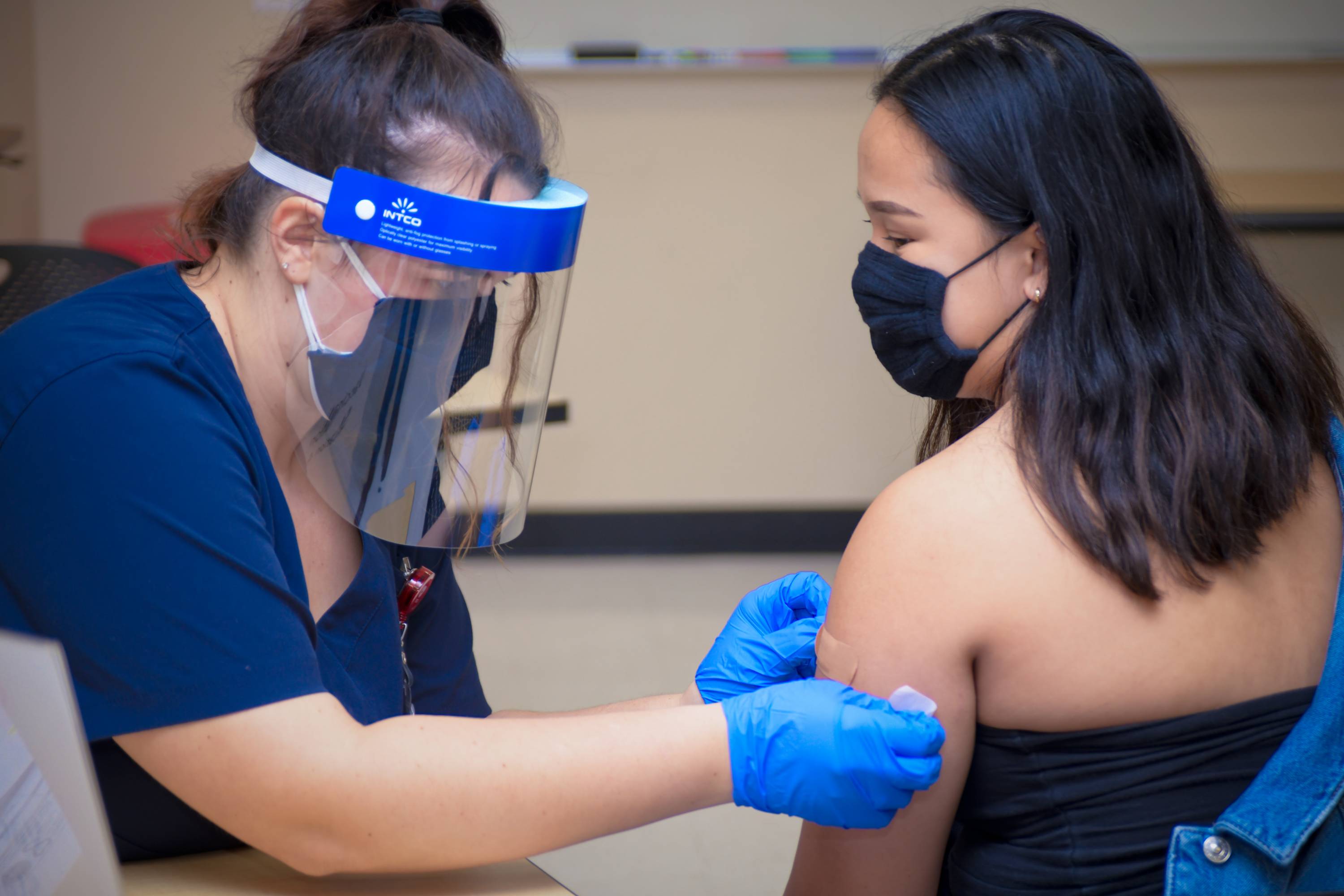 Woman Receiving Vaccination