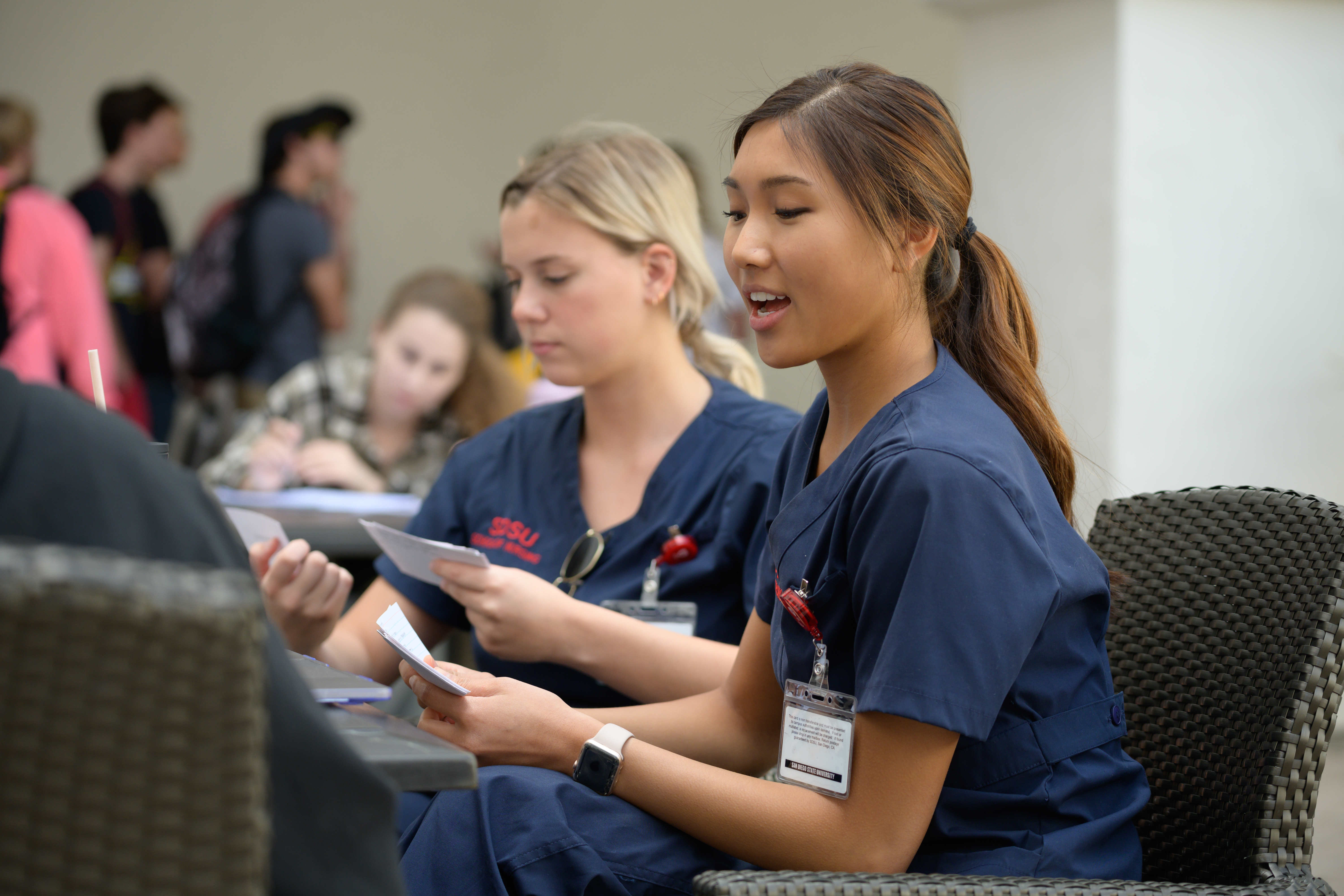 Nurses looking at papers.