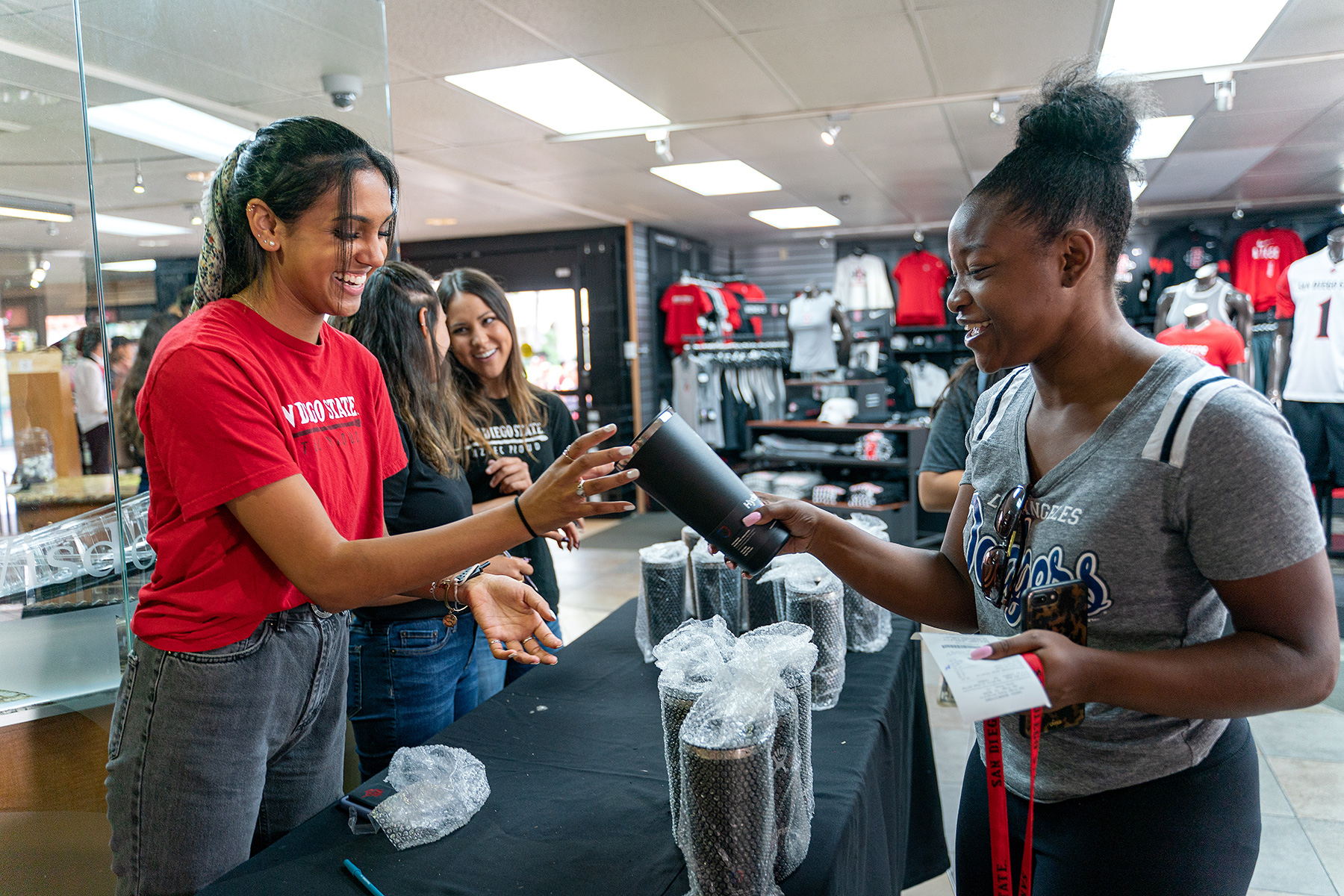 Students purchasing merchandise from the SDSU Bookstore